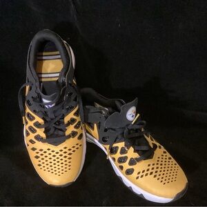 Athletic shoes, size 8, Nike brand, Steeler NFL logo